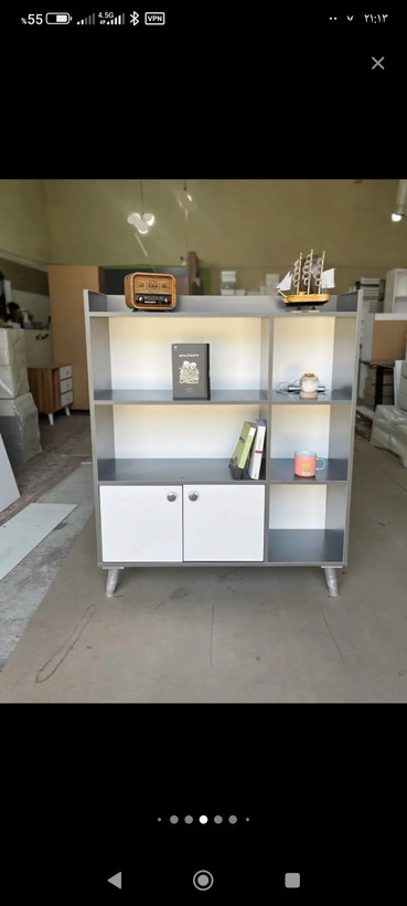 کتابخانه تولیدی چوب کرمی مدل B-LOFT با کمد دربدار و طبقات کاربردی