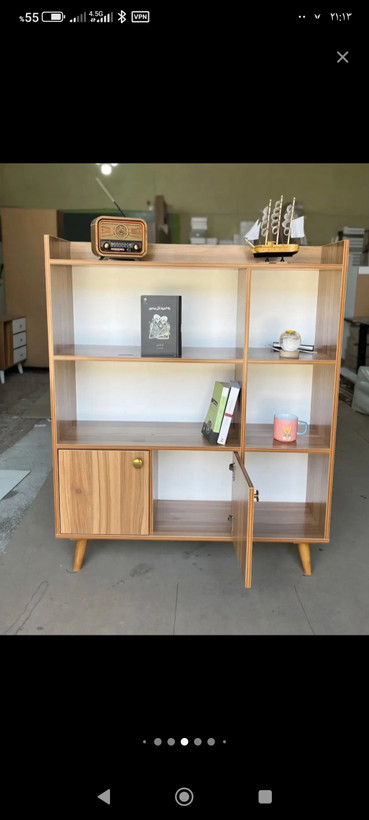 کتابخانه تولیدی چوب کرمی مدل B-LOFT با کمد دربدار و طبقات کاربردی
